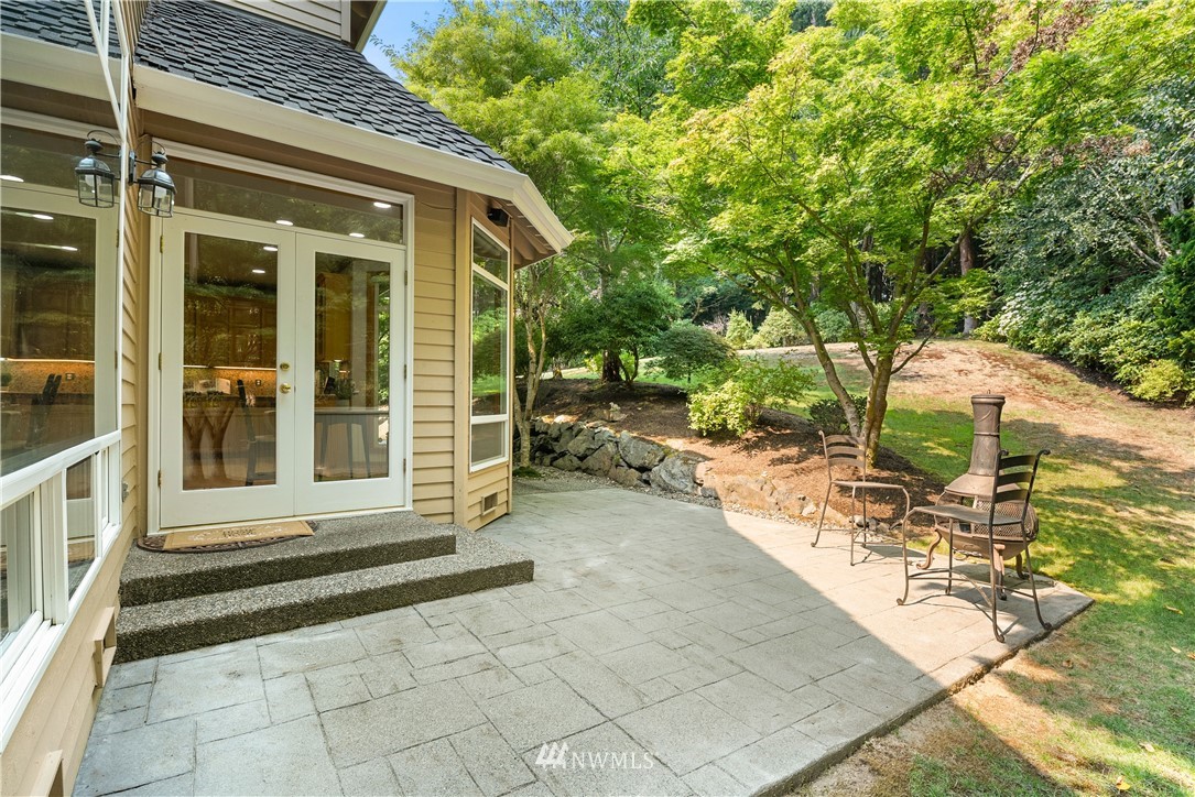 4729 176th Street Southeast Bothell, WA 98012 - Photo 38 of 40 a view of a house with backyard and sitting area