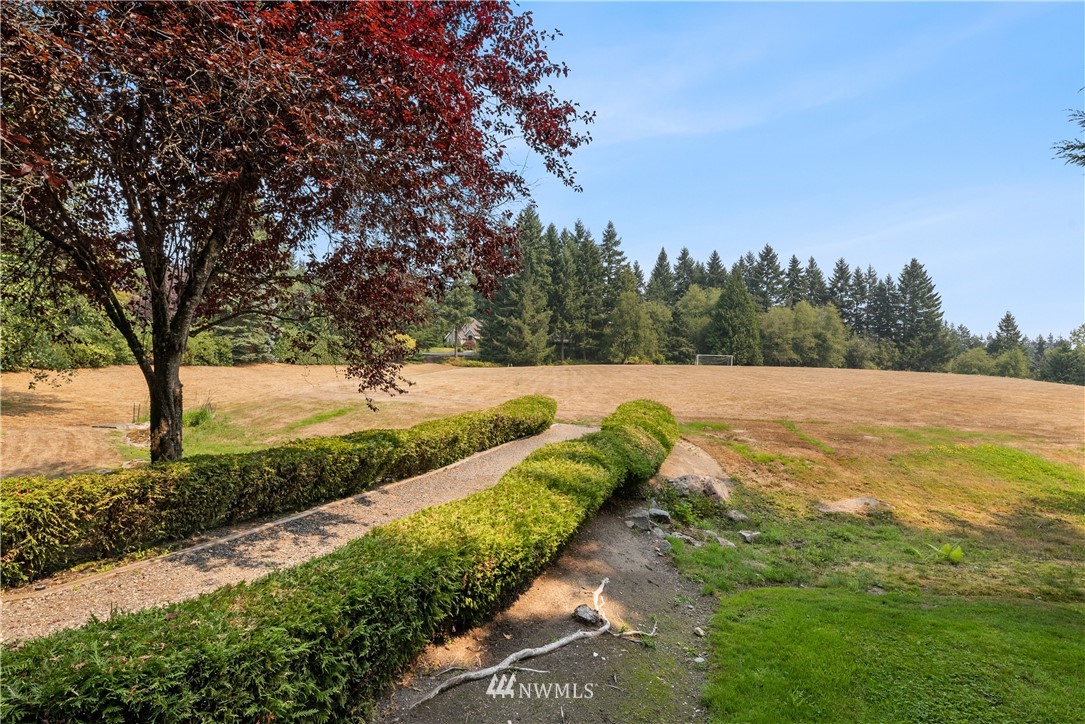 4729 176th Street Southeast Bothell, WA 98012 - Photo 40 of 40 a view of a lake with a yard