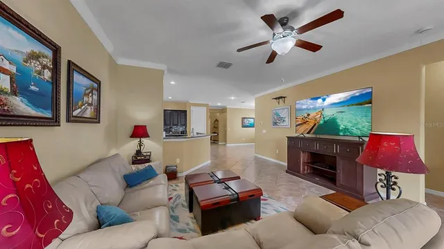 a bed room with a bed and a chandelier