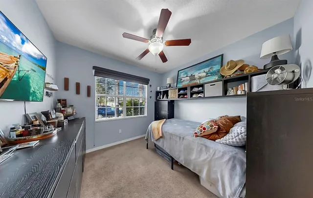 an aerial view of multiple houses with yard