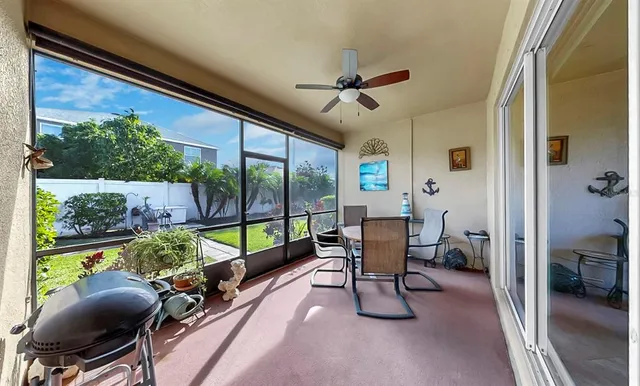 a view of a brick house with an outdoor space