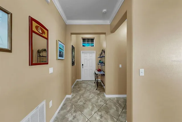 a kitchen with lots of counter top space appliances and cabinets
