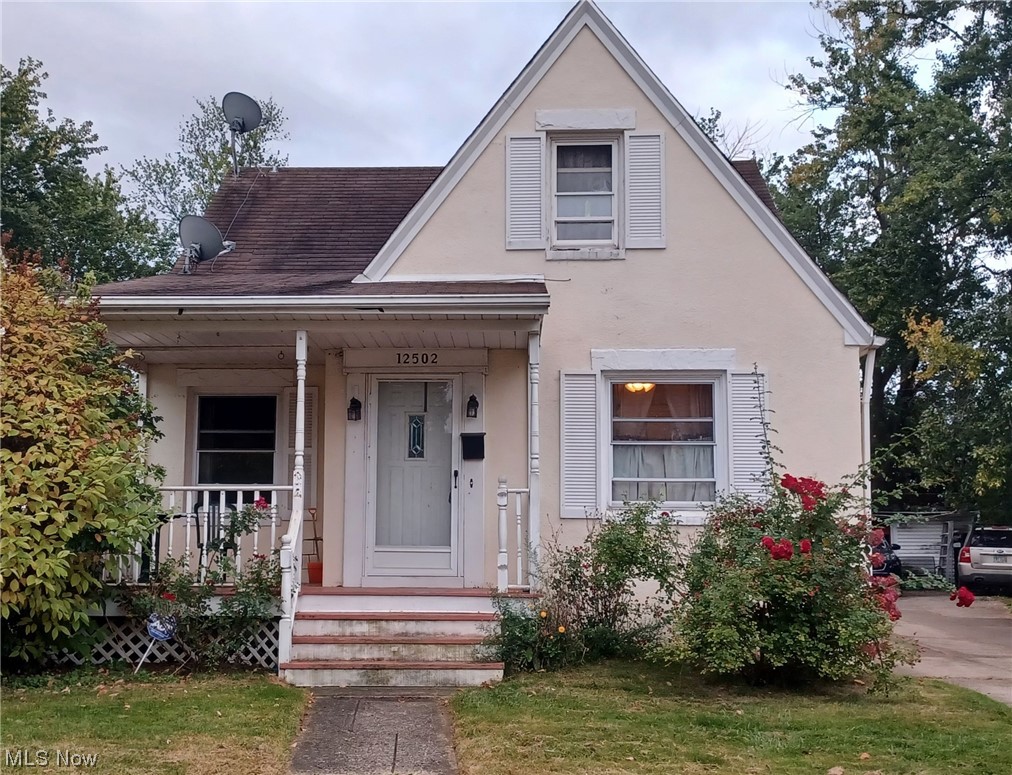 12502 Grannis Road Cleveland, OH 44125 - Photo 1 of 2 View of front of home featuring covered porch