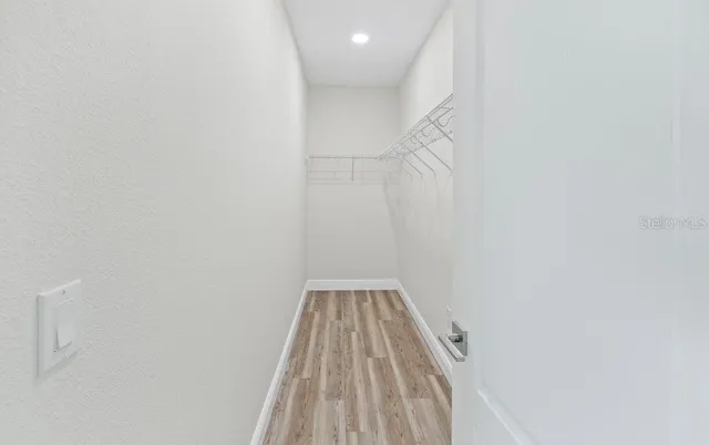 a view of wooden floor in kitchen