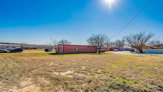 a view of a house with a snow in front of house