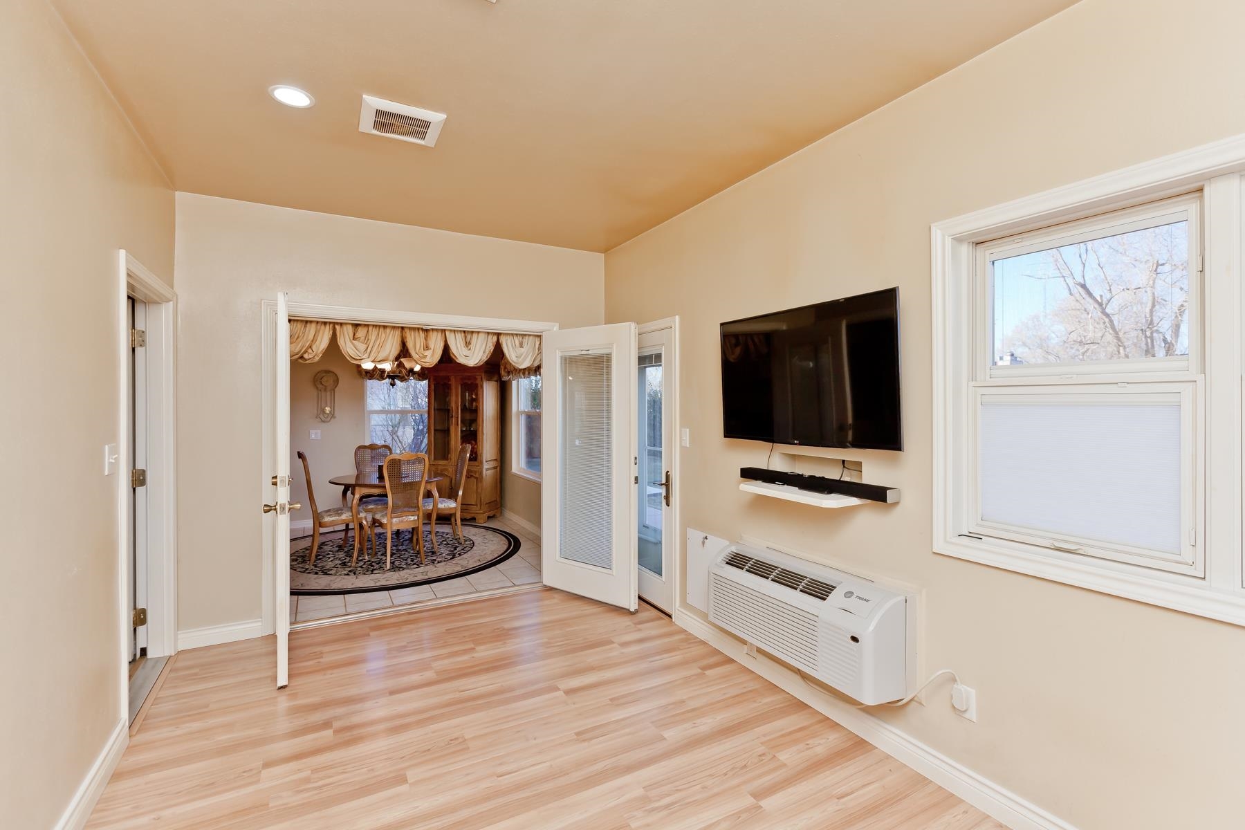 2912 El Torro Road Grand Junction, CO 81503 - Photo 14 of 34 a living room with furniture and a flat screen tv