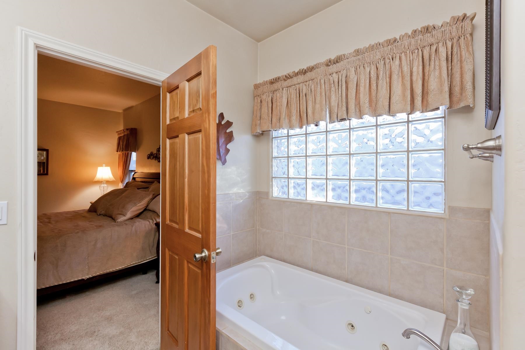2912 El Torro Road Grand Junction, CO 81503 - Photo 18 of 34 a bathroom with a tub and a shower