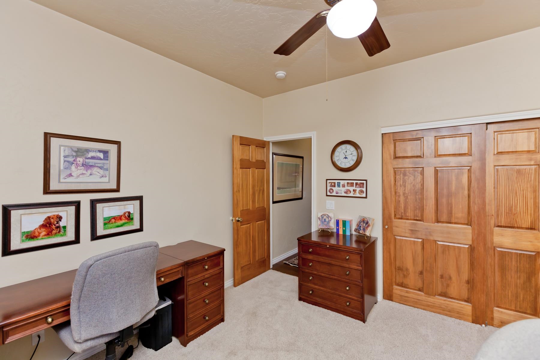 2912 El Torro Road Grand Junction, CO 81503 - Photo 27 of 34 a view of a workspace with furniture and a ceiling fan