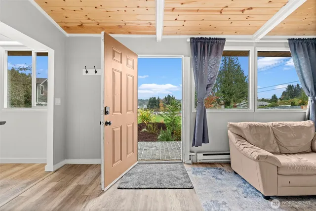 a living room with furniture and a gate