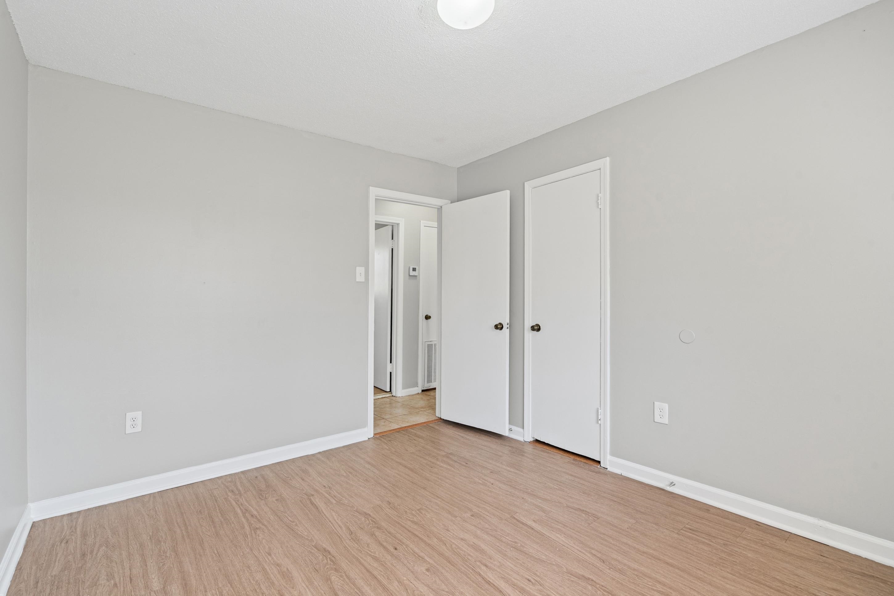 496 Greenview Cove Collierville, TN 38017 - Photo 15 of 24 a view of an empty room and wooden floor