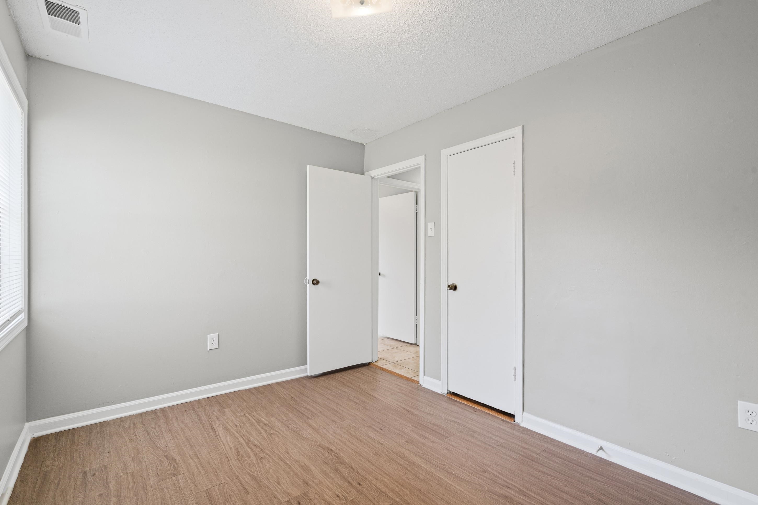 496 Greenview Cove Collierville, TN 38017 - Photo 17 of 24 a view of an empty room and wooden floor