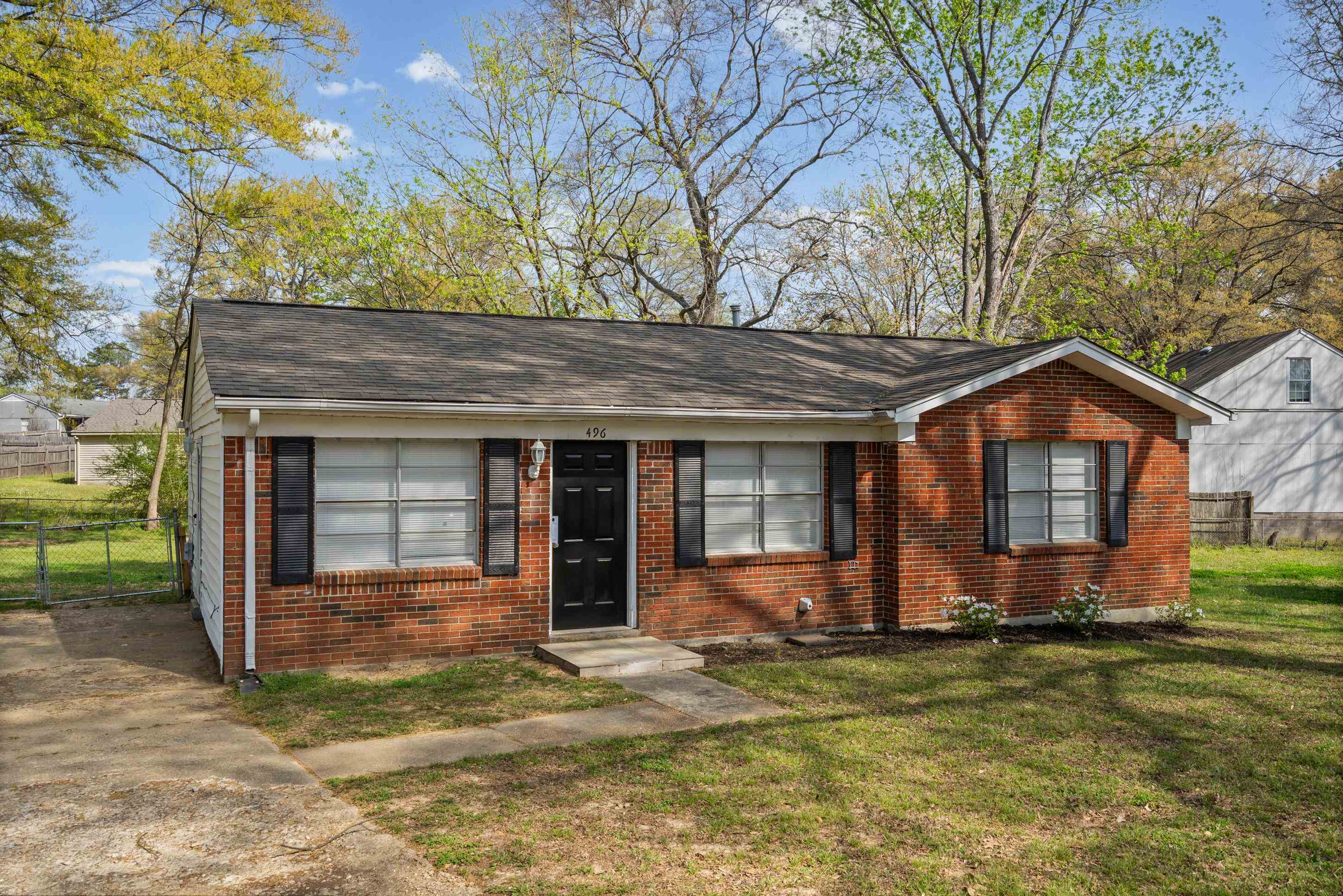 496 Greenview Cove Collierville, TN 38017 - Photo 2 of 24 a view of a house with a yard