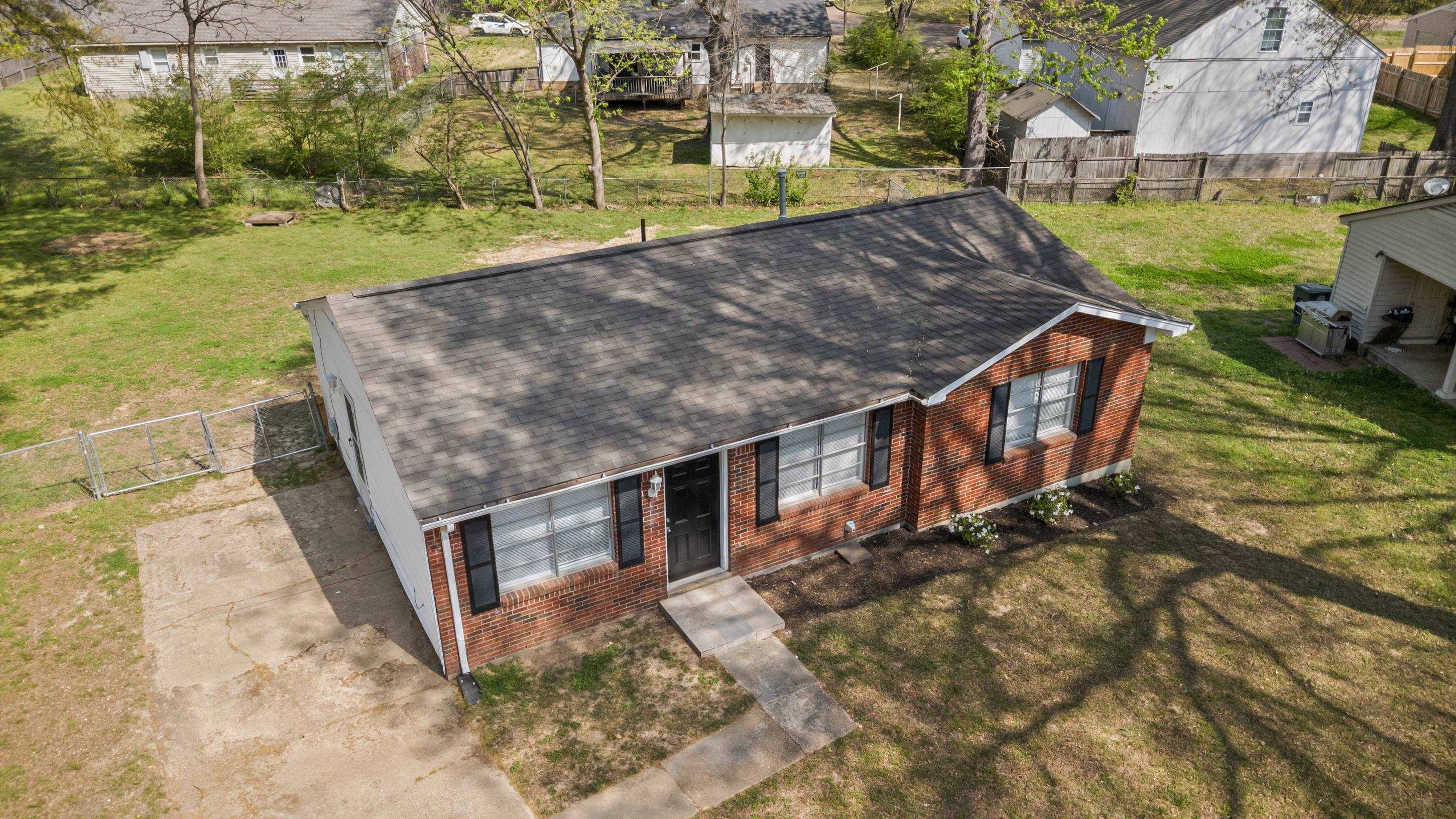 496 Greenview Cove Collierville, TN 38017 - Photo 24 of 24 front view of a house with a yard