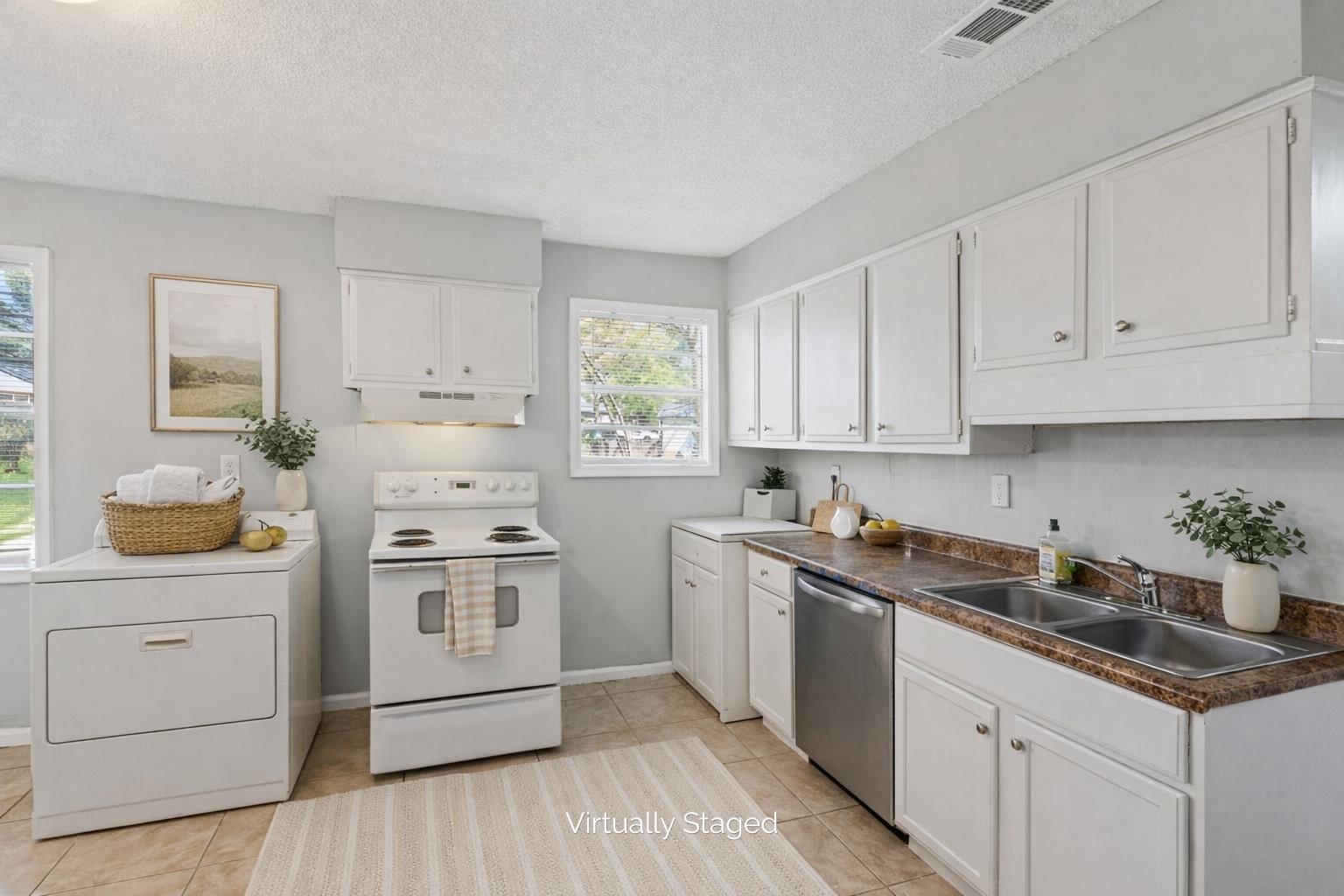 496 Greenview Cove Collierville, TN 38017 - Photo 6 of 24 a kitchen with white cabinets sink and appliances