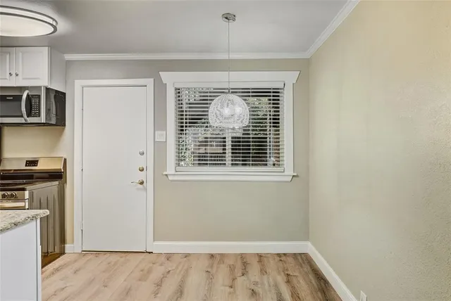 a view of kitchen and utility room