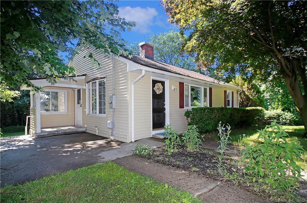 97 Potuccos Ring Road Wolcott, CT 06716 - Photo 1 of 1 a view of a house with a yard