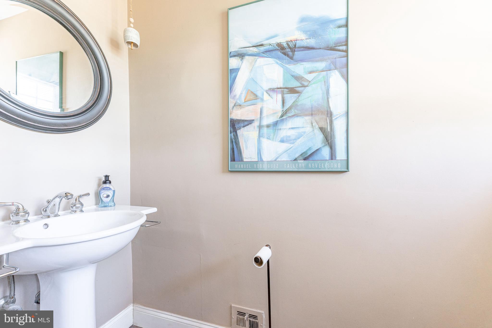 84 North Spring Lane Phoenixville, PA 19460 - Photo 24 of 51 a bathroom with a sink and a mirror