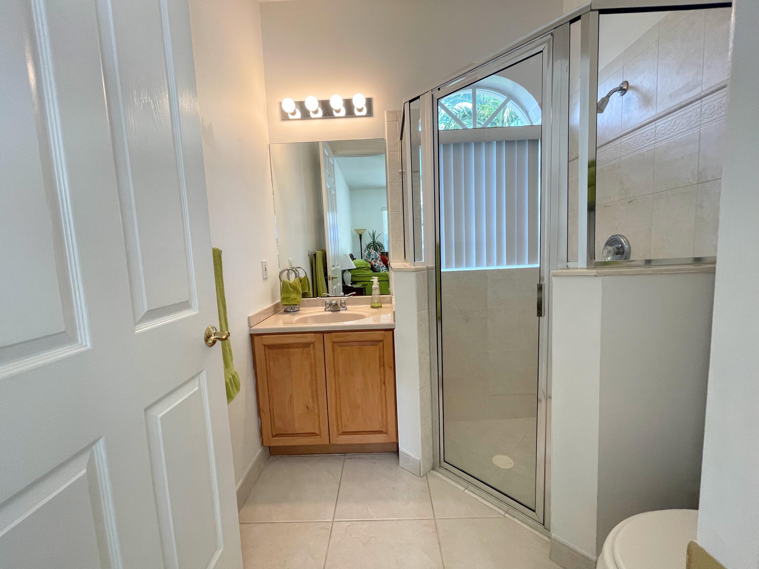 7060 Northwest Turtle Walk Boca Raton, FL 33487 - Photo 49 of 51 Courtyard House bathroom