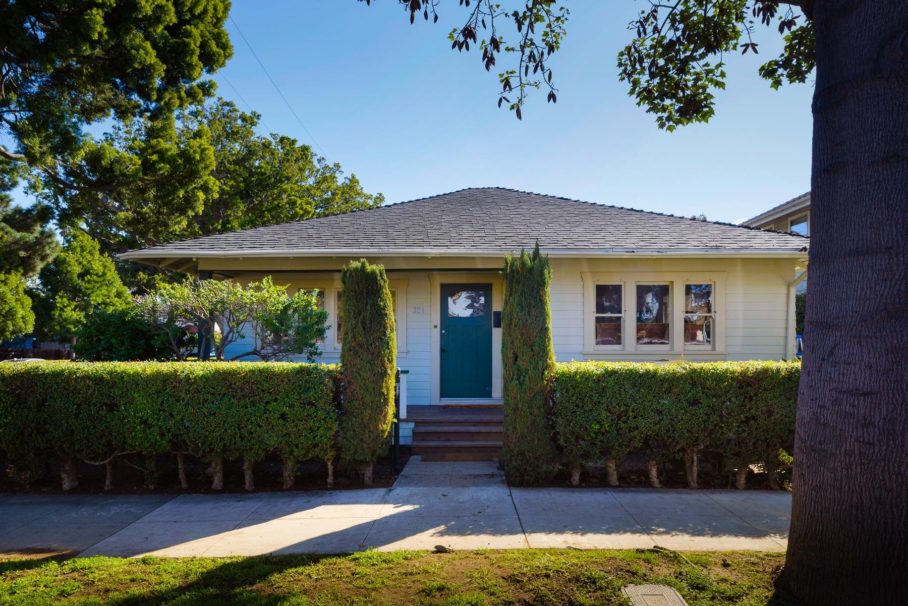 a view of a house with a garden