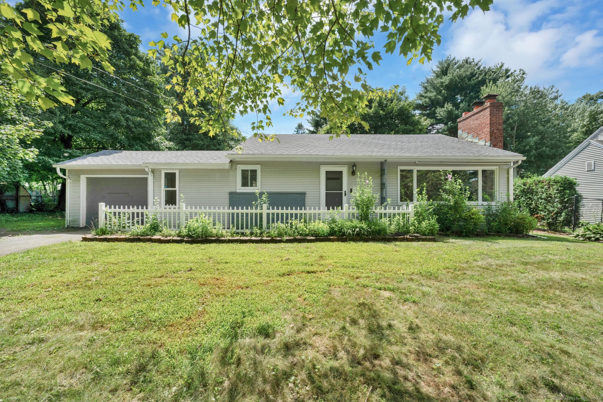 425 Cedar Street Newington, CT 06111 - Photo 1 of 1 a front view of a house with a yard and trees