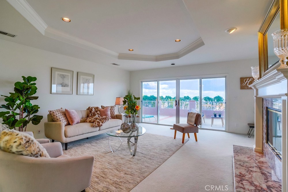 1820 Mantis Avenue San Pedro, CA 90732 - Photo 11 of 55 a living room with furniture and a floor to ceiling window