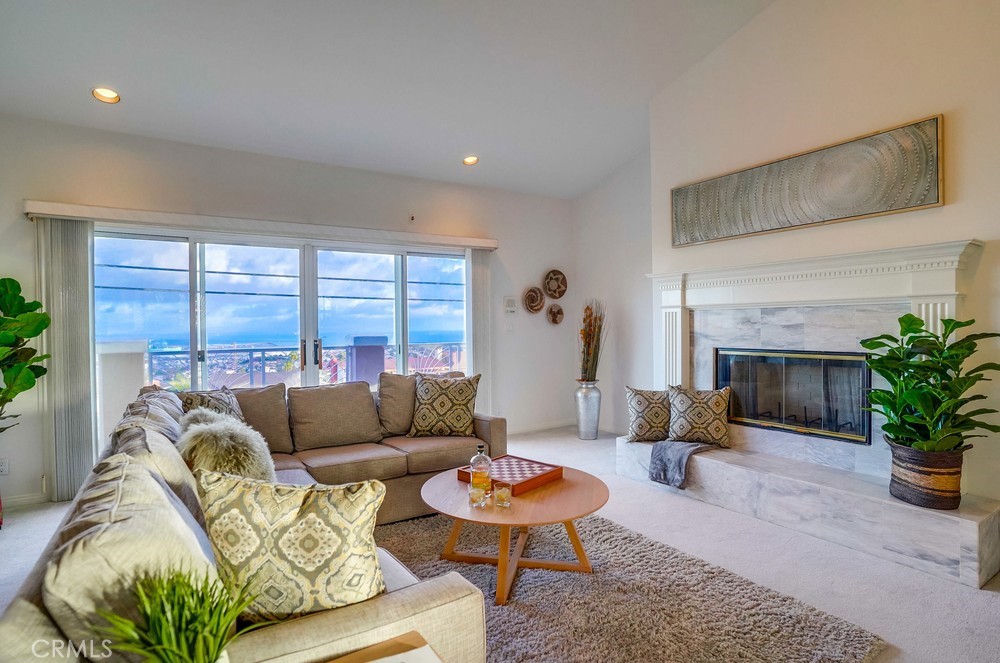 1820 Mantis Avenue San Pedro, CA 90732 - Photo 26 of 55 a living room with furniture and a large window