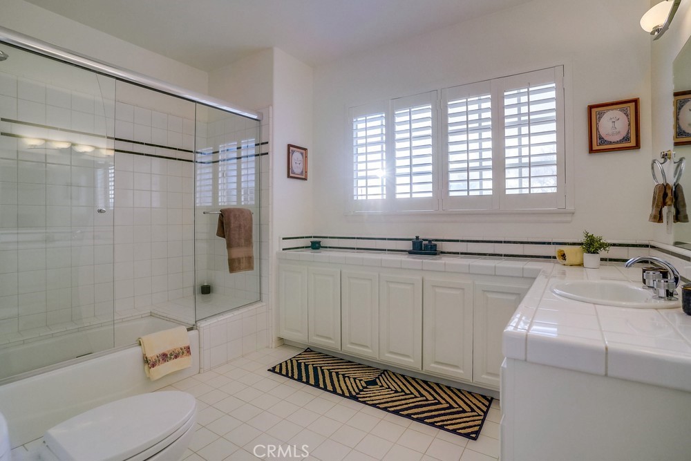 1820 Mantis Avenue San Pedro, CA 90732 - Photo 33 of 55 a bathroom with a sink a toilet and shower