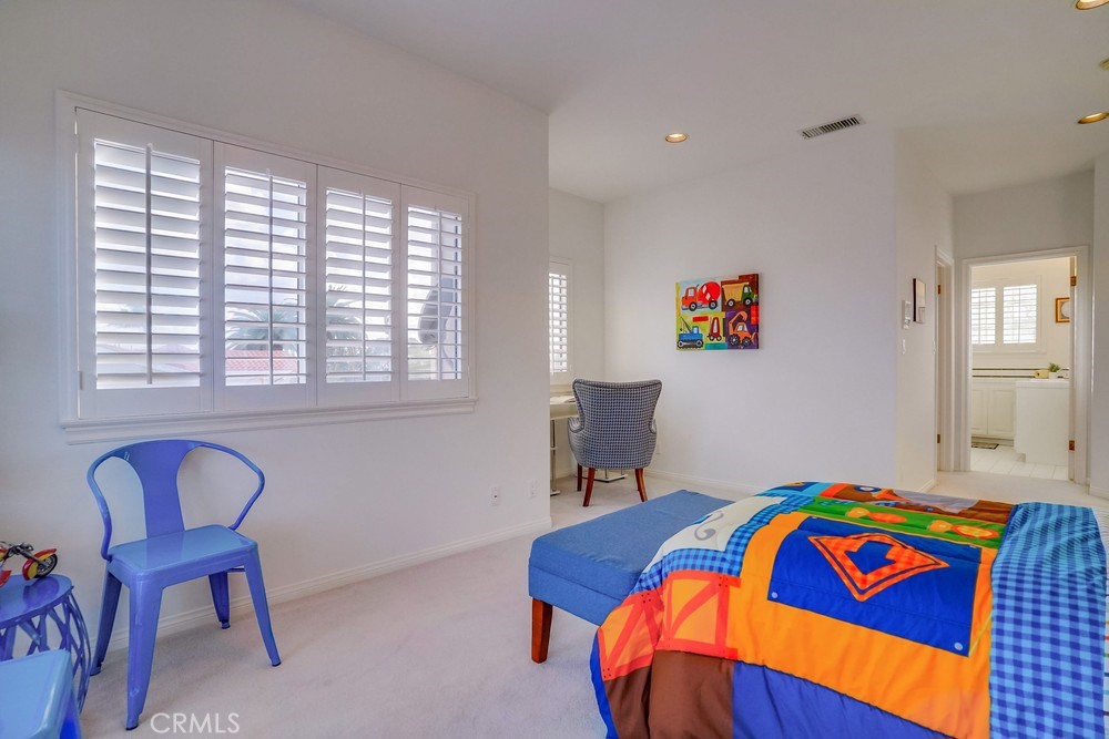 1820 Mantis Avenue San Pedro, CA 90732 - Photo 38 of 55 a bedroom with a bed and a chair