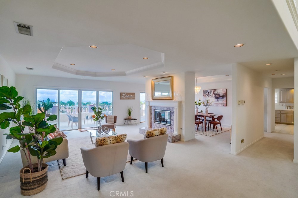 1820 Mantis Avenue San Pedro, CA 90732 - Photo 10 of 55 a living room with furniture a potted plant and a large window
