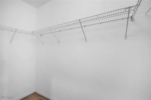 a view of a room with racks on the wall