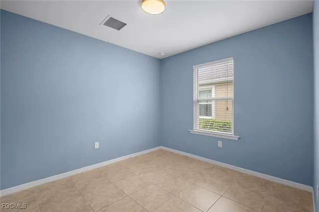 a view of a door and a window