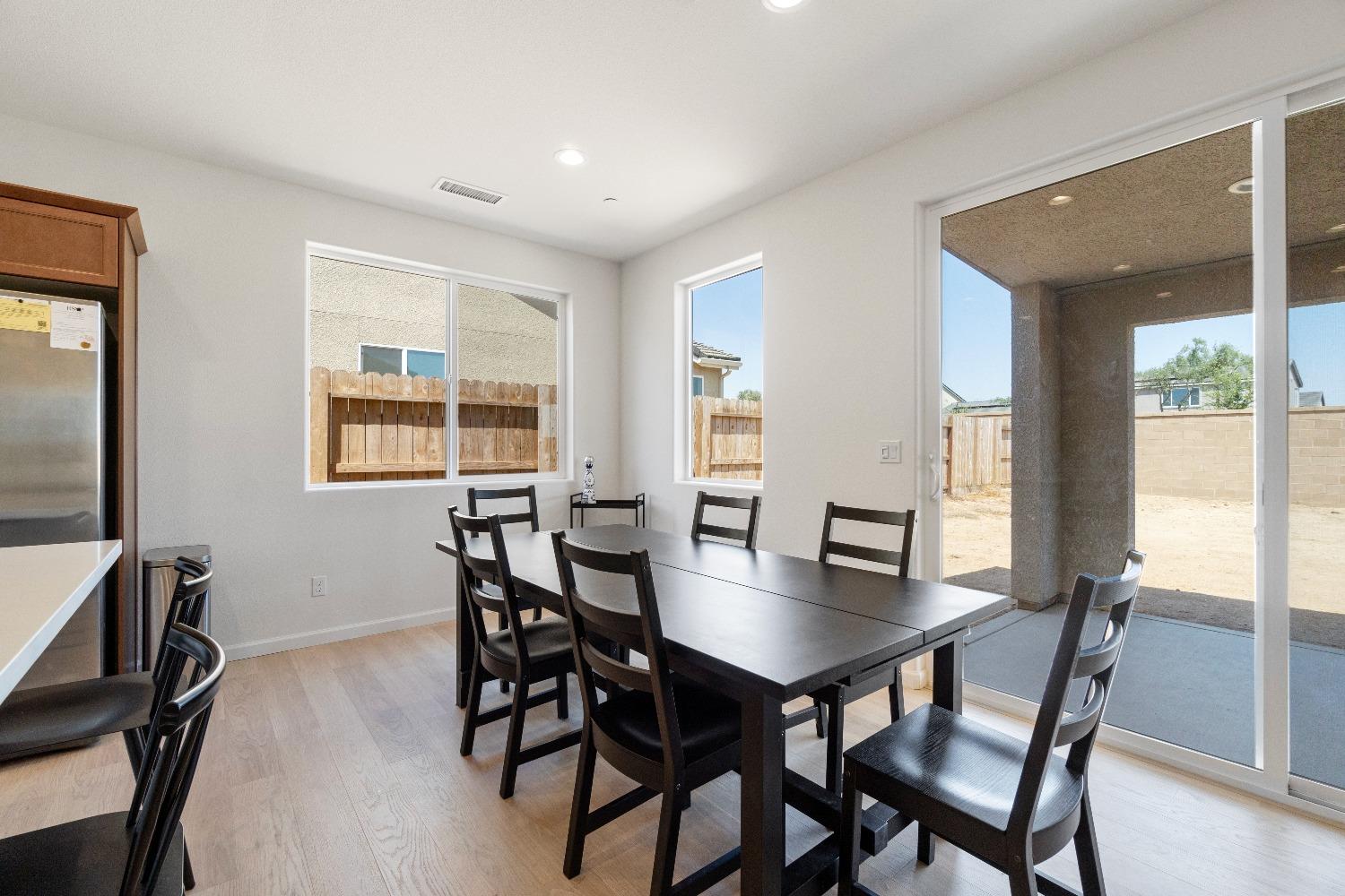 1241 Peters Road Madera, CA 93636 - Photo 17 of 37 a view of a dining room with furniture and window