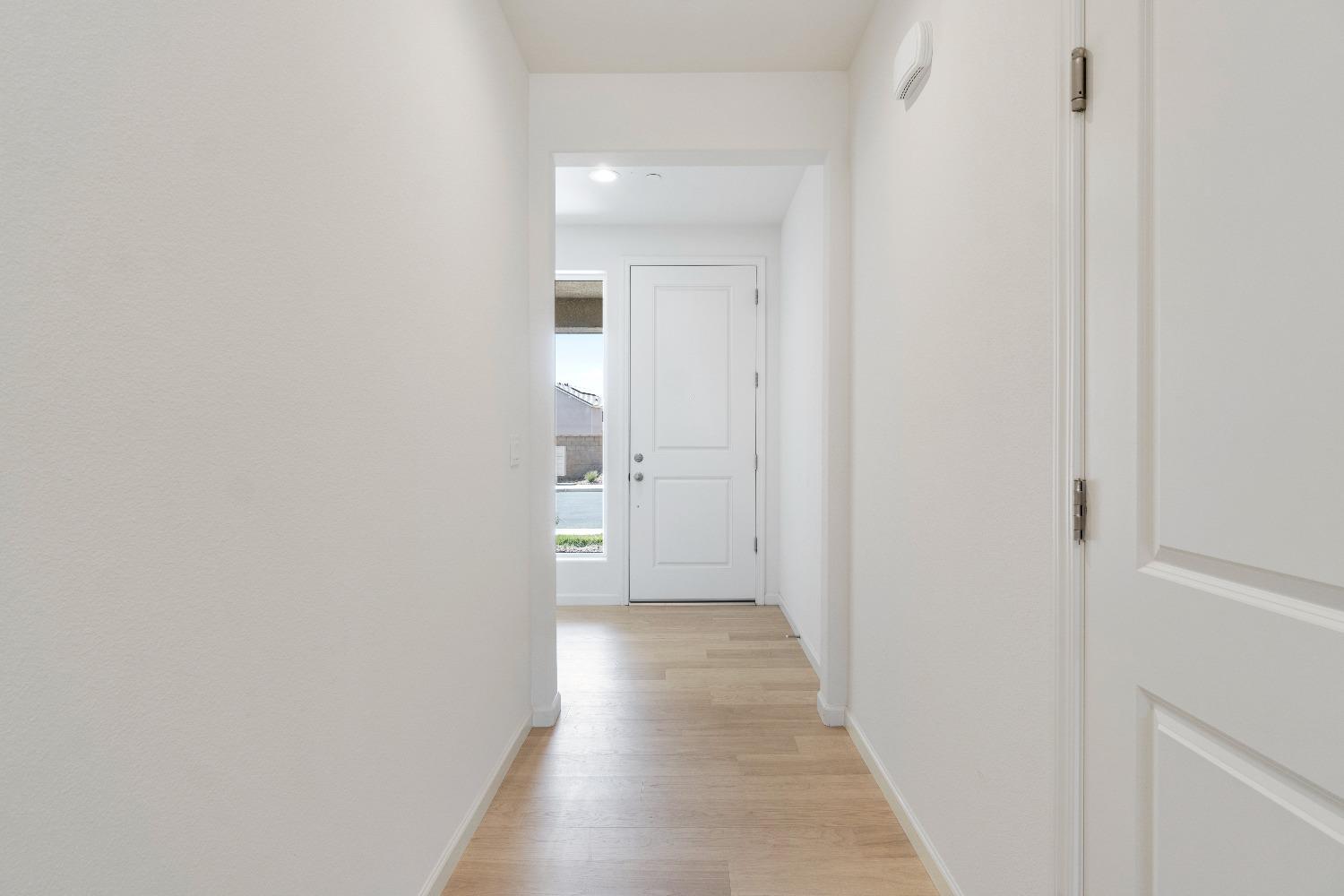 1241 Peters Road Madera, CA 93636 - Photo 20 of 37 a view of a room with a hallway