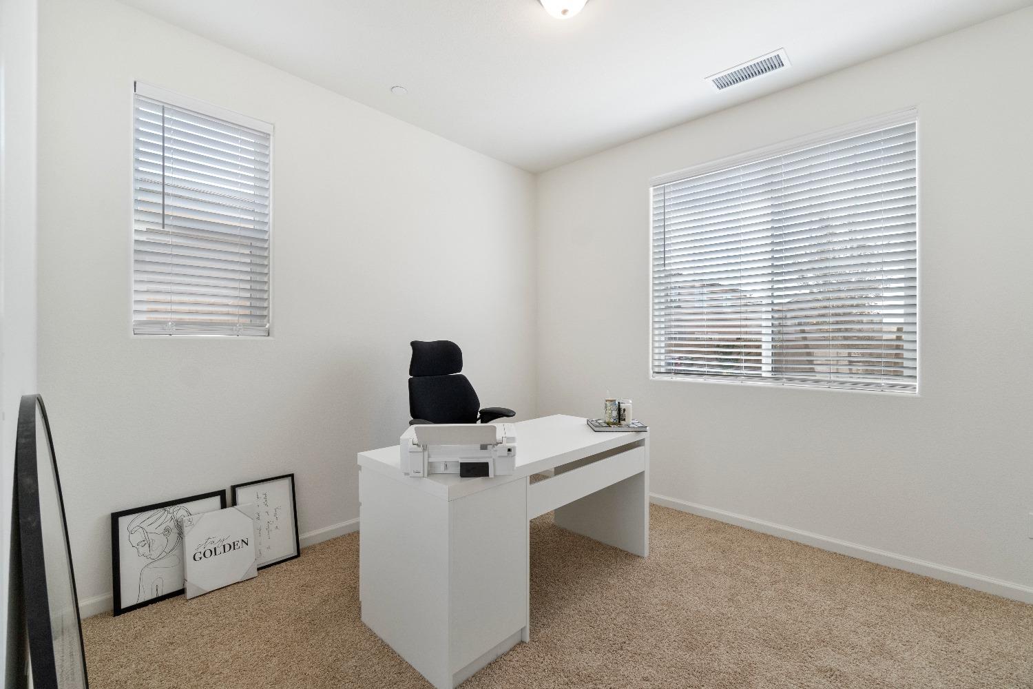 1241 Peters Road Madera, CA 93636 - Photo 21 of 37 a room with furniture and window