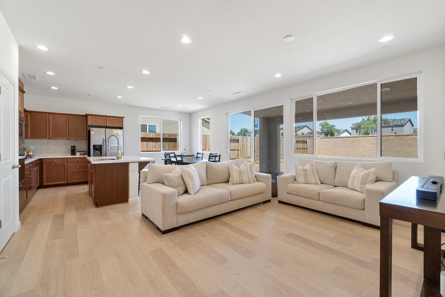 1241 Peters Road Madera, CA 93636 - Photo 3 of 37 a living room with furniture and a large window