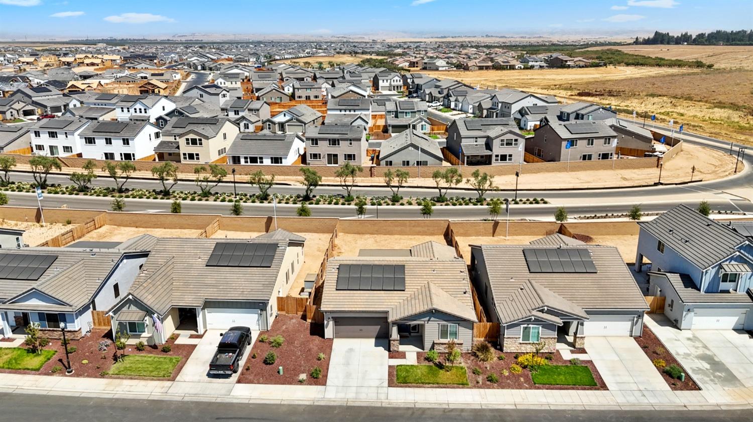 1241 Peters Road Madera, CA 93636 - Photo 8 of 37 an aerial view of residential houses with outdoor space