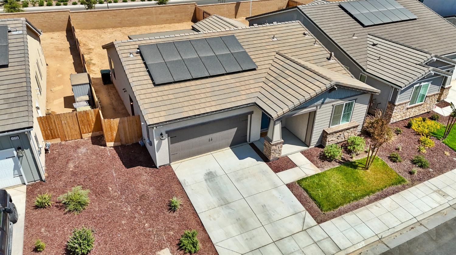 1241 Peters Road Madera, CA 93636 - Photo 9 of 37 a view of a house with a yard