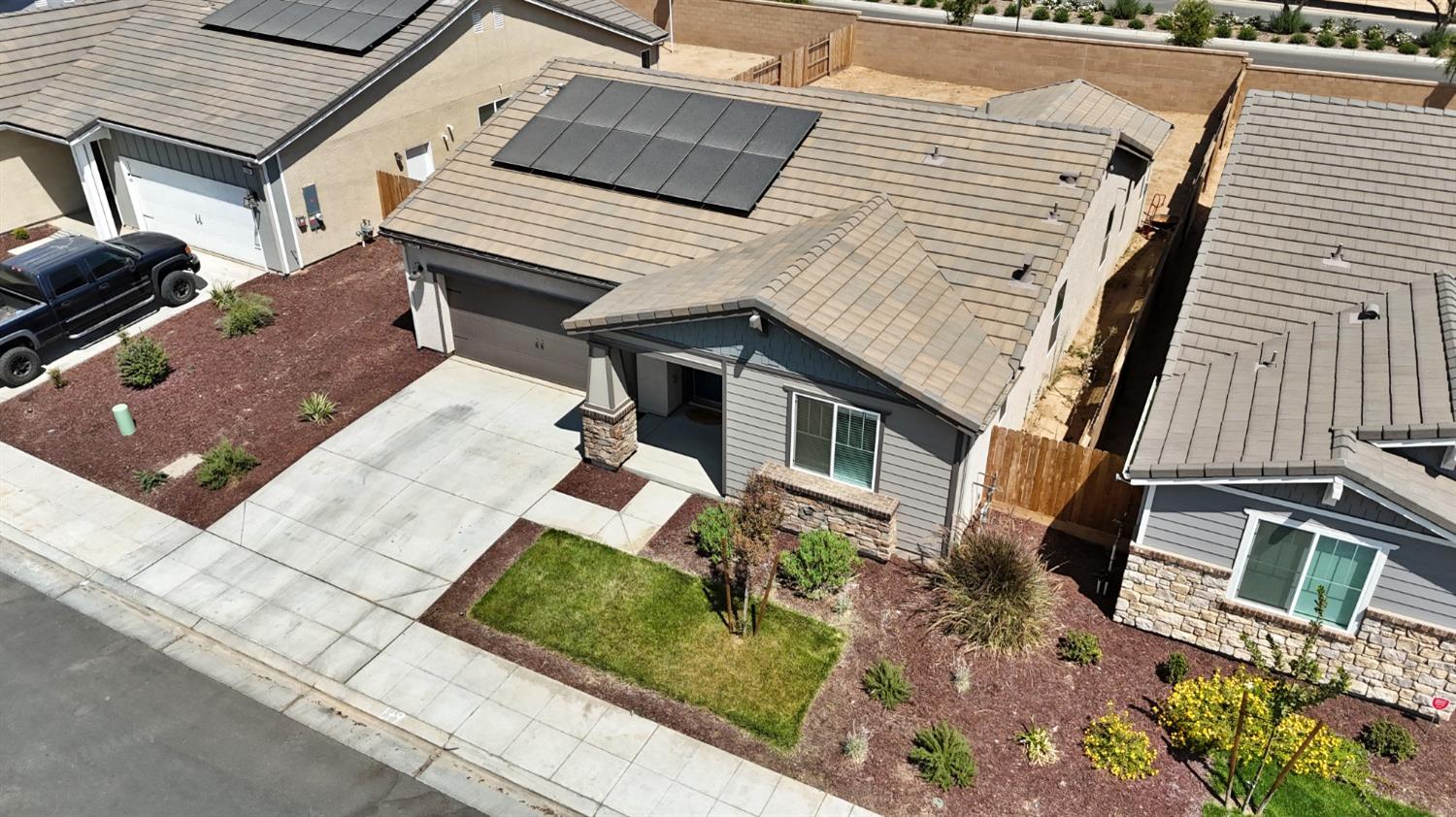 1241 Peters Road Madera, CA 93636 - Photo 10 of 37 front view of a house with a yard