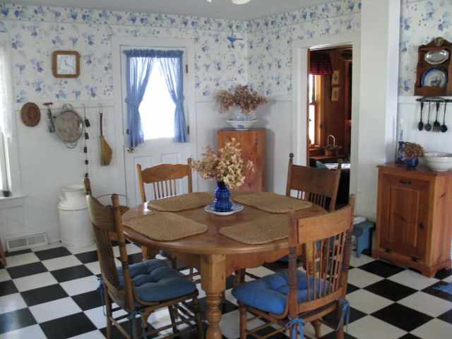 8942 North Unity Road Winslow, IL 61089 - Photo 3 of 12 a view of a dining room with furniture and chandelier