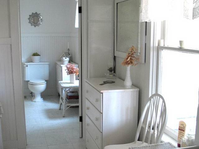 8942 North Unity Road Winslow, IL 61089 - Photo 9 of 12 a bathroom with a sink toilet and shower
