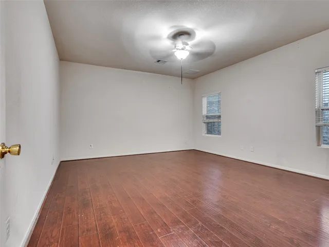 a bathroom with a tub and a shower