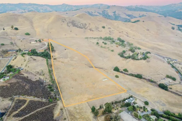 a view of a backyard of a house