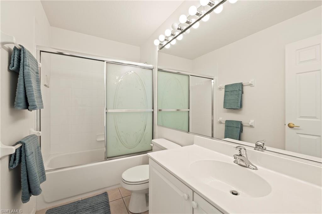 17887 Modena Road Miromar Lakes, FL 33913 - Photo 23 of 50 a bathroom with a sink toilet and shower