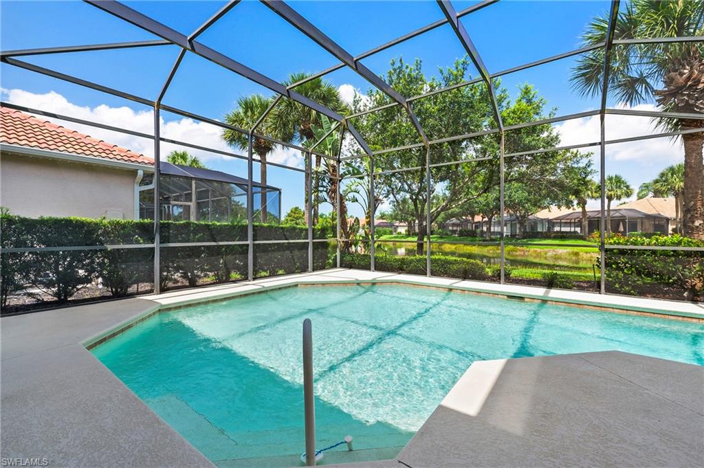 17887 Modena Road Miromar Lakes, FL 33913 - Photo 28 of 50 a view of a backyard with sitting area