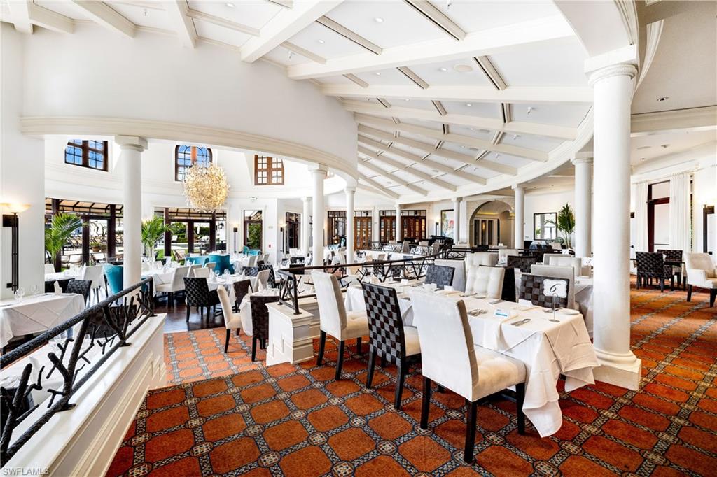 17887 Modena Road Miromar Lakes, FL 33913 - Photo 42 of 50 a view of a dining room with furniture