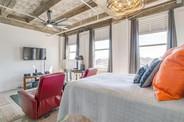 a kitchen with kitchen island granite countertop a sink appliances cabinets and counter space