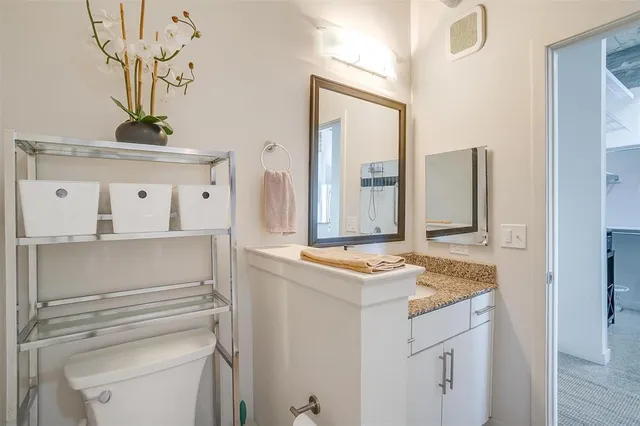a bathroom with a shower and a bathtub