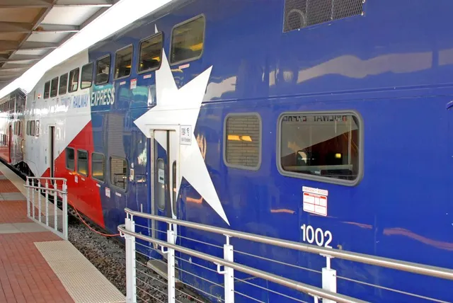 a view of a swimming pool with a bench