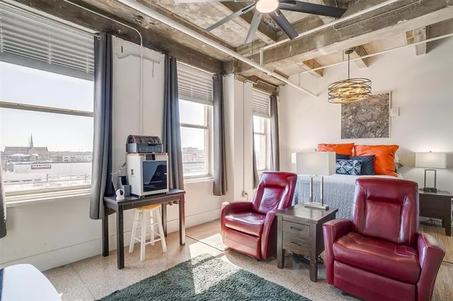 a kitchen with stainless steel appliances a stove and a refrigerator