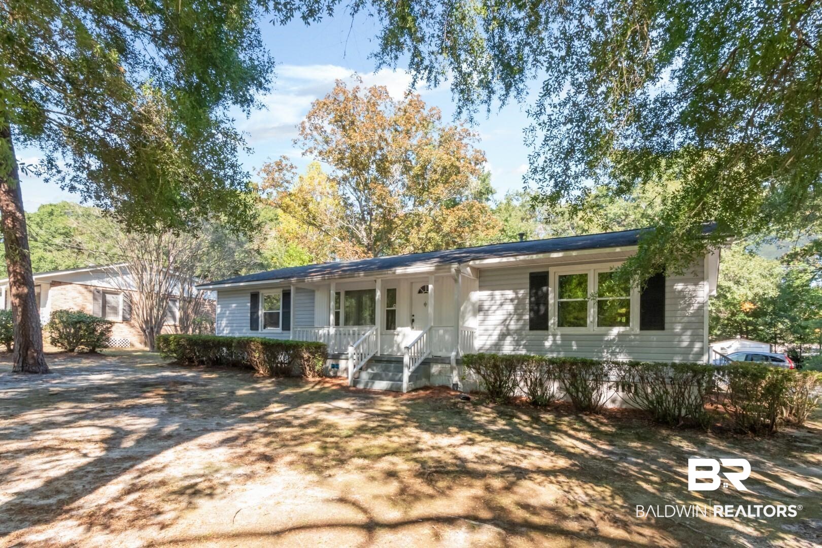 1321 Rainbow Drive West Mobile, AL 36693 - Photo 4 of 48 Ranch-style house with covered porch